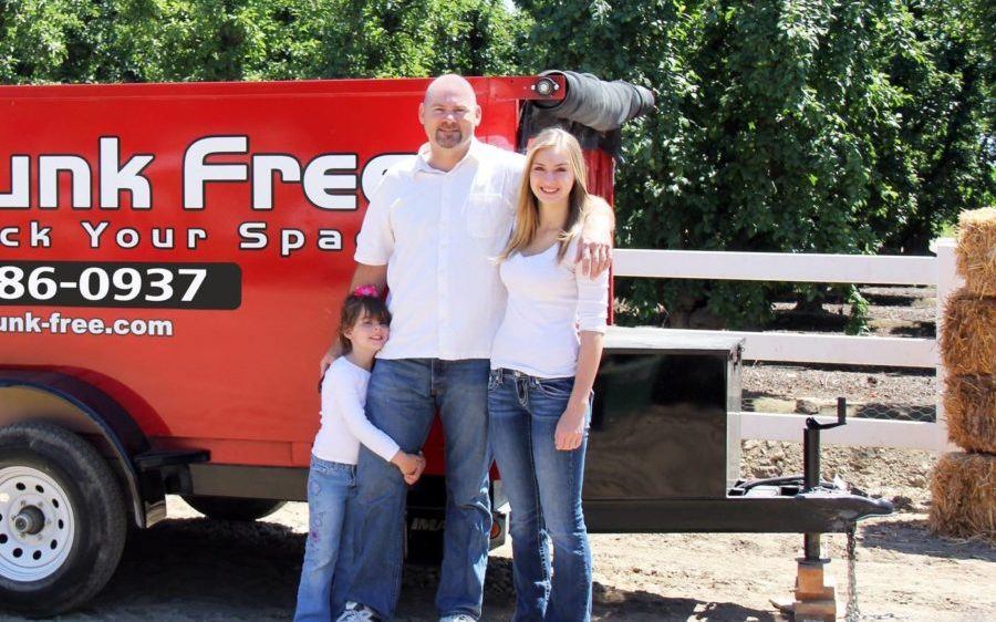 be junk free family in front of truck